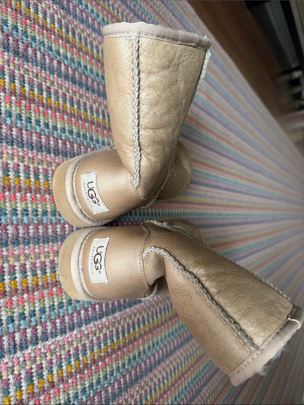 UGG women’s Metallic Gold Sheepskin Booties